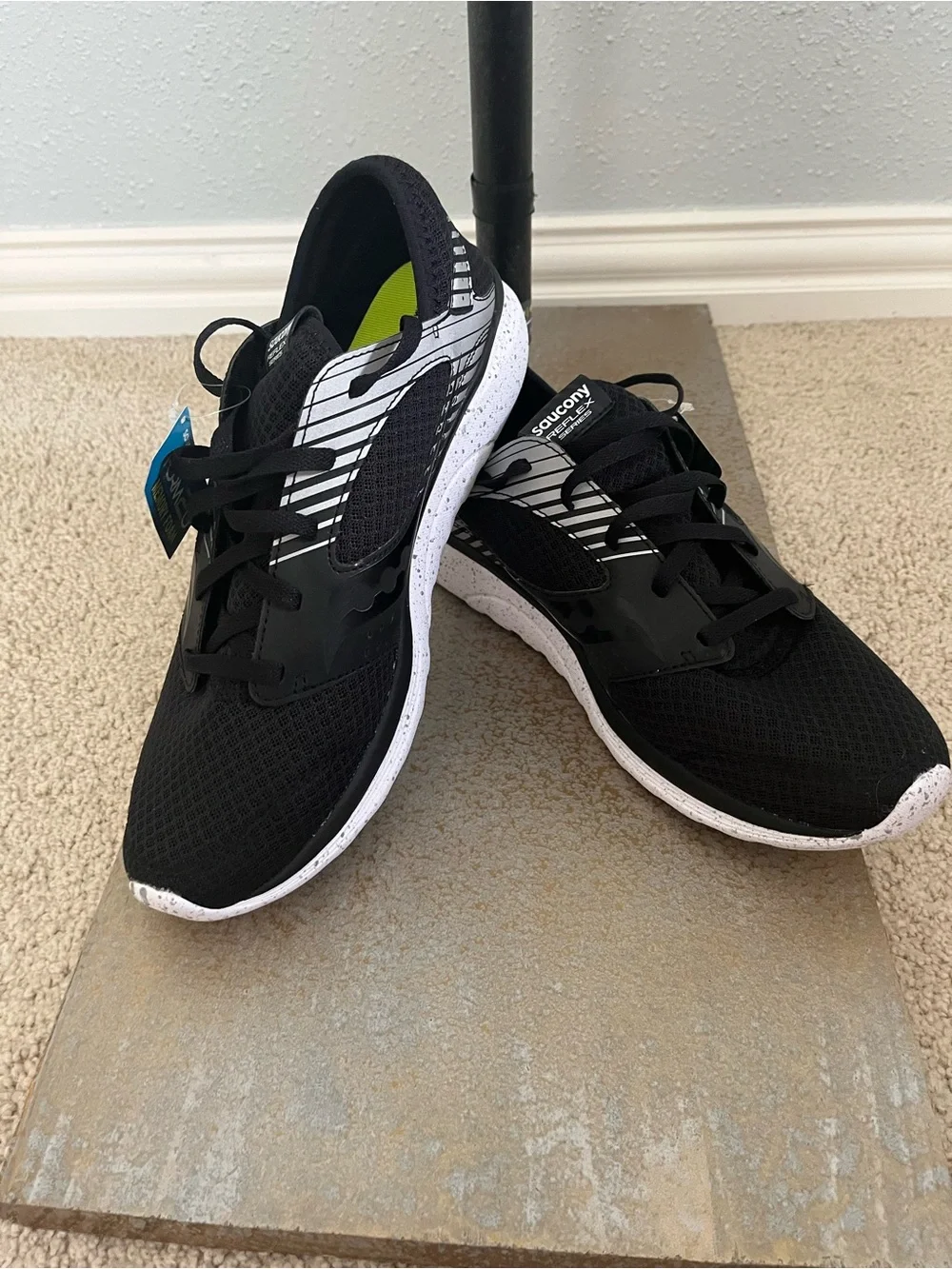 Saucony Men’s Black Athletic Shoes with White Speckled Soles